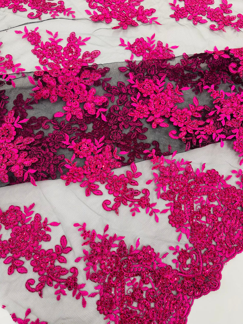 Fuchsia Metallic corded embroider with sequins on a Black mesh lace fabric-prom-sold by the yard.
