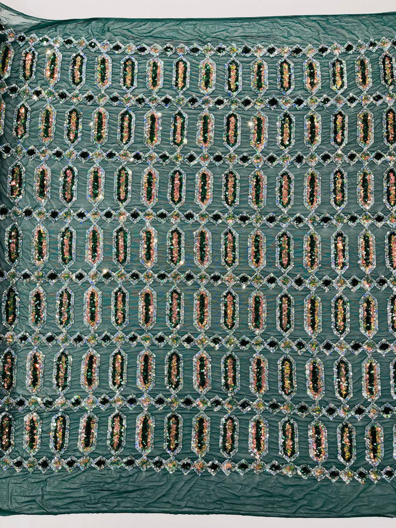 Emerald/Silver multi color iridescent Jewel sequin design on a Green 4 way stretch mesh fabric.