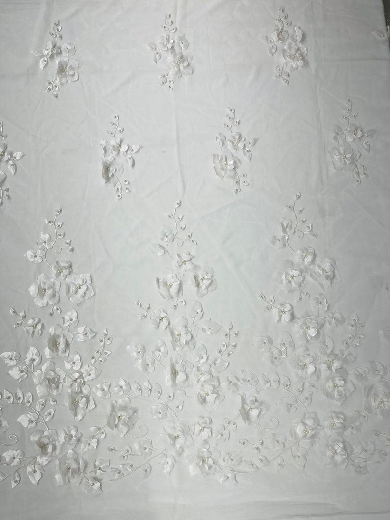 Orquidia 3d floral design embroider with pearls in a mesh lace fabric-prom-sold by the yard.