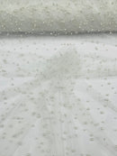 Heavy Scattered Pearls Studded Mesh, 2-Way Stretch, sold by the yard.