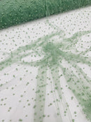 Heavy Scattered Pearls Studded Mesh, 2-Way Stretch, sold by the yard.