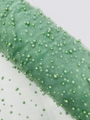 Heavy Scattered Pearls Studded Mesh, 2-Way Stretch, sold by the yard.