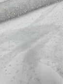 Heavy Scattered Pearls Studded Mesh, 2-Way Stretch, sold by the yard.