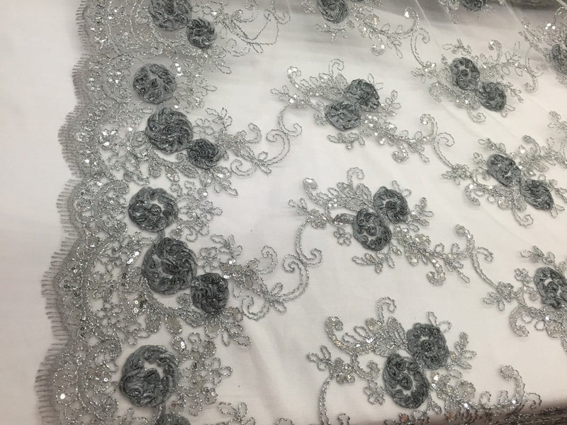 Gray/silver  3d flowers embroider with sequins on a mesh lace fabric. Sold by the yard.