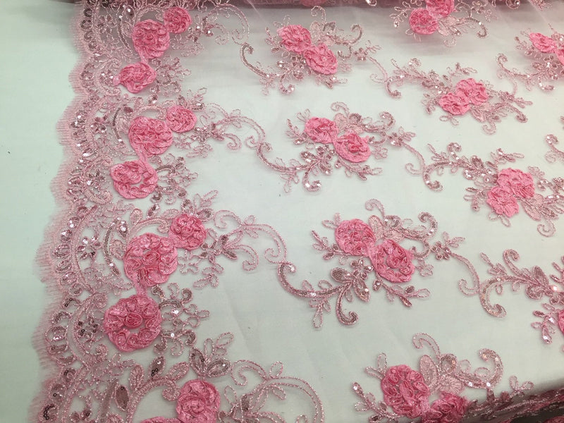 Pink 3d flowers embroider with sequins on a mesh lace fabric. Sold by the yard.