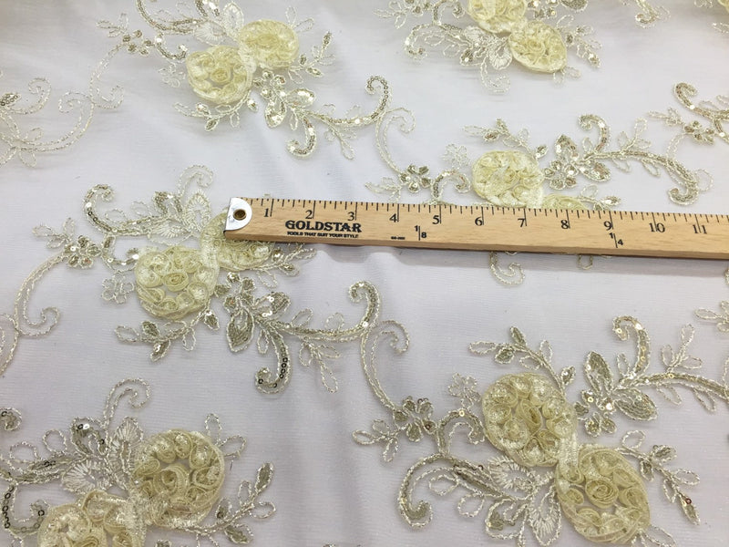 Ivory 3d flowers embroider with sequins on a mesh lace fabric. Sold by the yard.