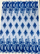 Metallic corded embroider flowers with Paisley design on a mesh lace fabric-prom