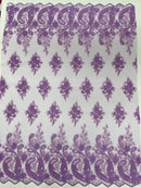 Metallic corded embroider flowers with Paisley design on a mesh lace fabric-prom