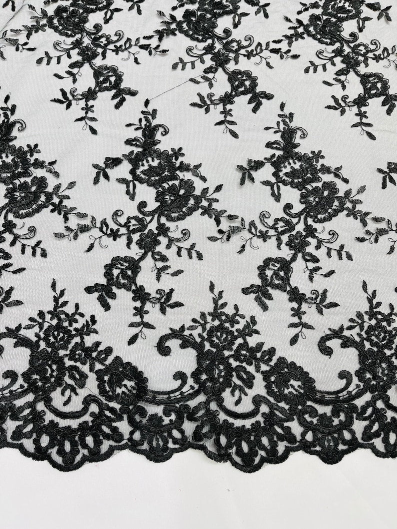 Black Corded embroider flowers on a mesh lace fabric-prom-sold by the yard.