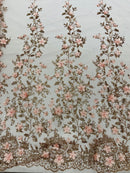 Princess Glitter 3d floral design embroidery with pearls in a mesh lace-sold by the yard.