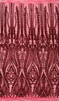 Damask design with sequins embroider on a 4 way stretch mesh fabric.