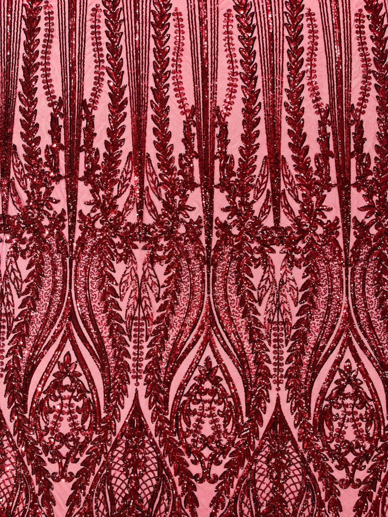 Damask design with sequins embroider on a 4 way stretch mesh fabric.