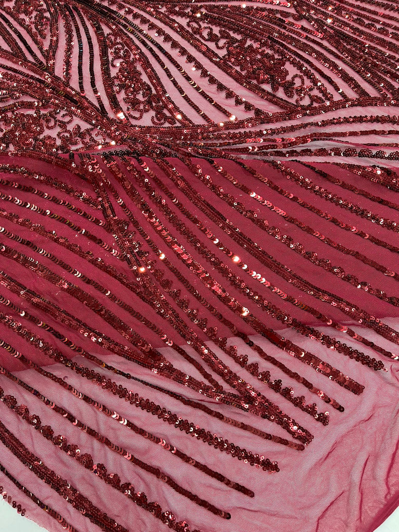 Geometric Feather wing shiny sequin design on a 4 way stretch mesh Fabric-old by the yard.