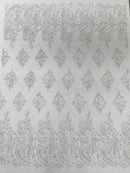 Metallic corded embroider flowers with Paisley design on a mesh lace fabric-prom