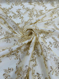 Flower lace corded and embroider with sequins on a mesh-Sold by the yard.