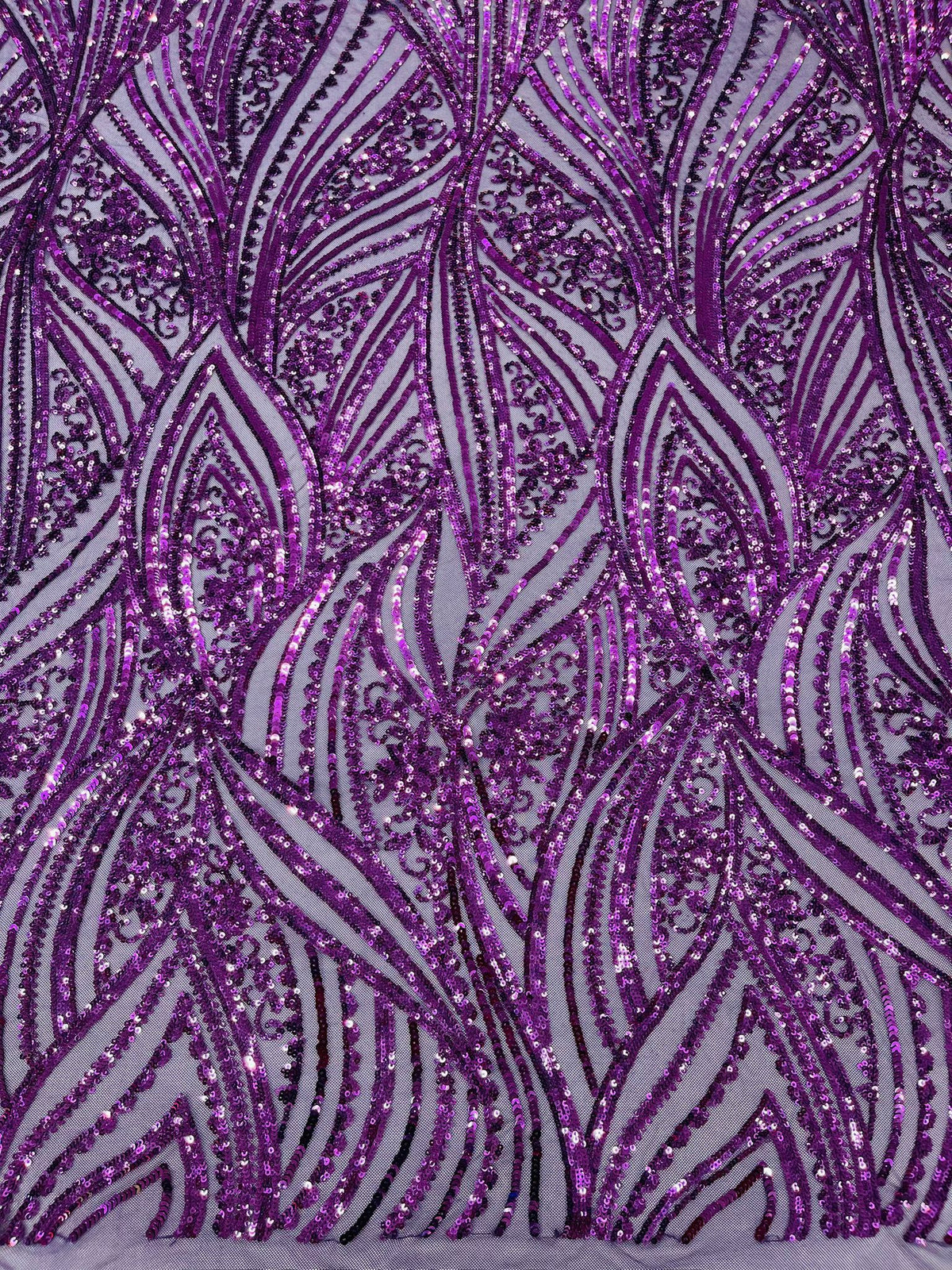 Geometric Feather wing shiny sequin design on a 4 way