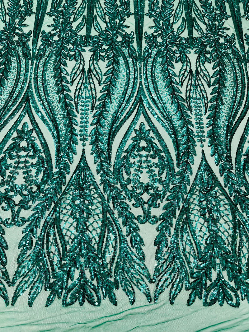 Damask design with sequins embroider on a 4 way stretch mesh fabric.