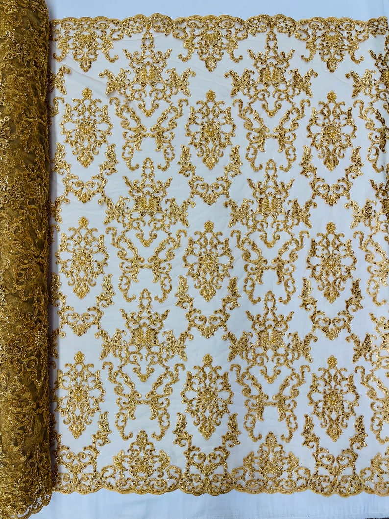 Gold Damask embroider with sequins and heavy beaded on a mesh lace fabric-sold by the yard