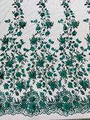 Princess Glitter 3d floral design embroidery with pearls in a mesh lace-sold by the yard.