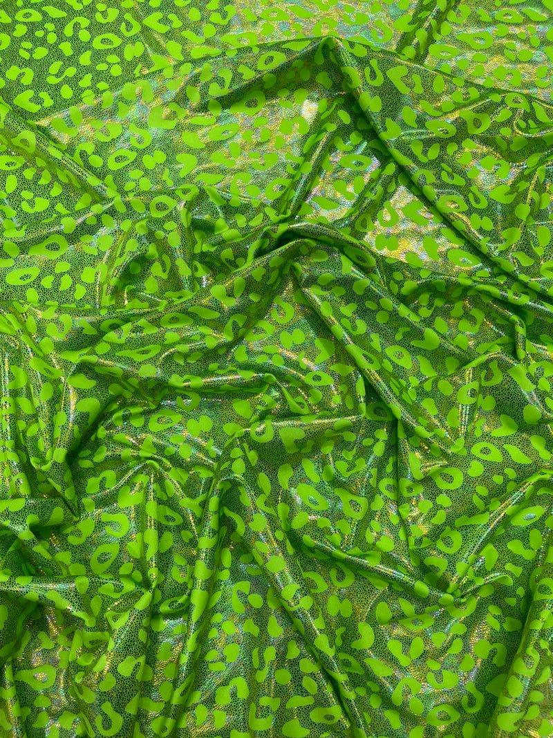 Leopard oil spill metallic print on a stretch nylon spandex tricot/milliskin -sold by the yard.