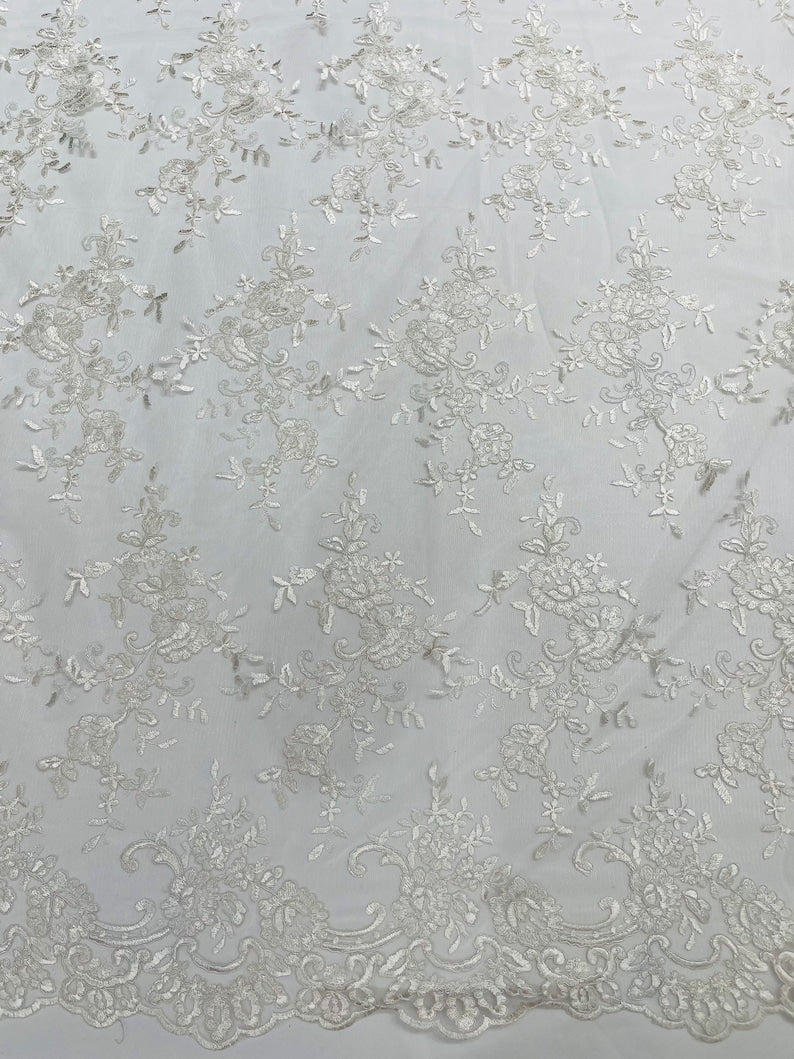 Ivory Corded embroider flowers on a mesh lace fabric-prom-sold by the yard.