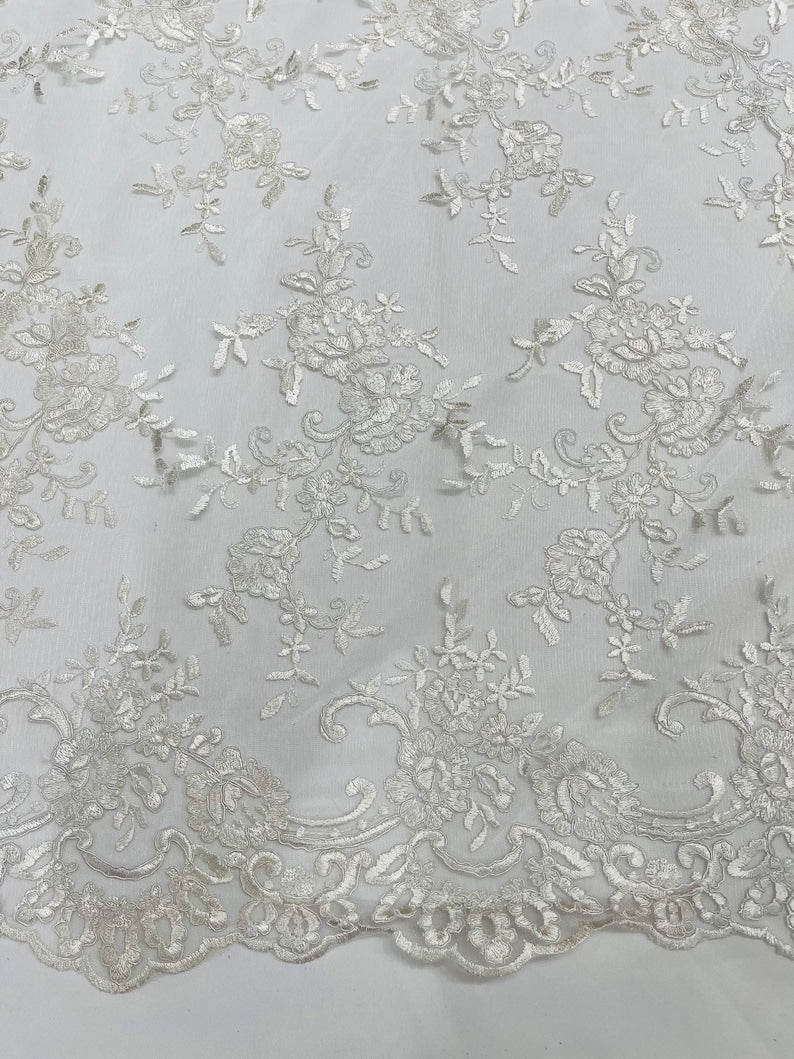 Ivory Corded embroider flowers on a mesh lace fabric-prom-sold by the yard.