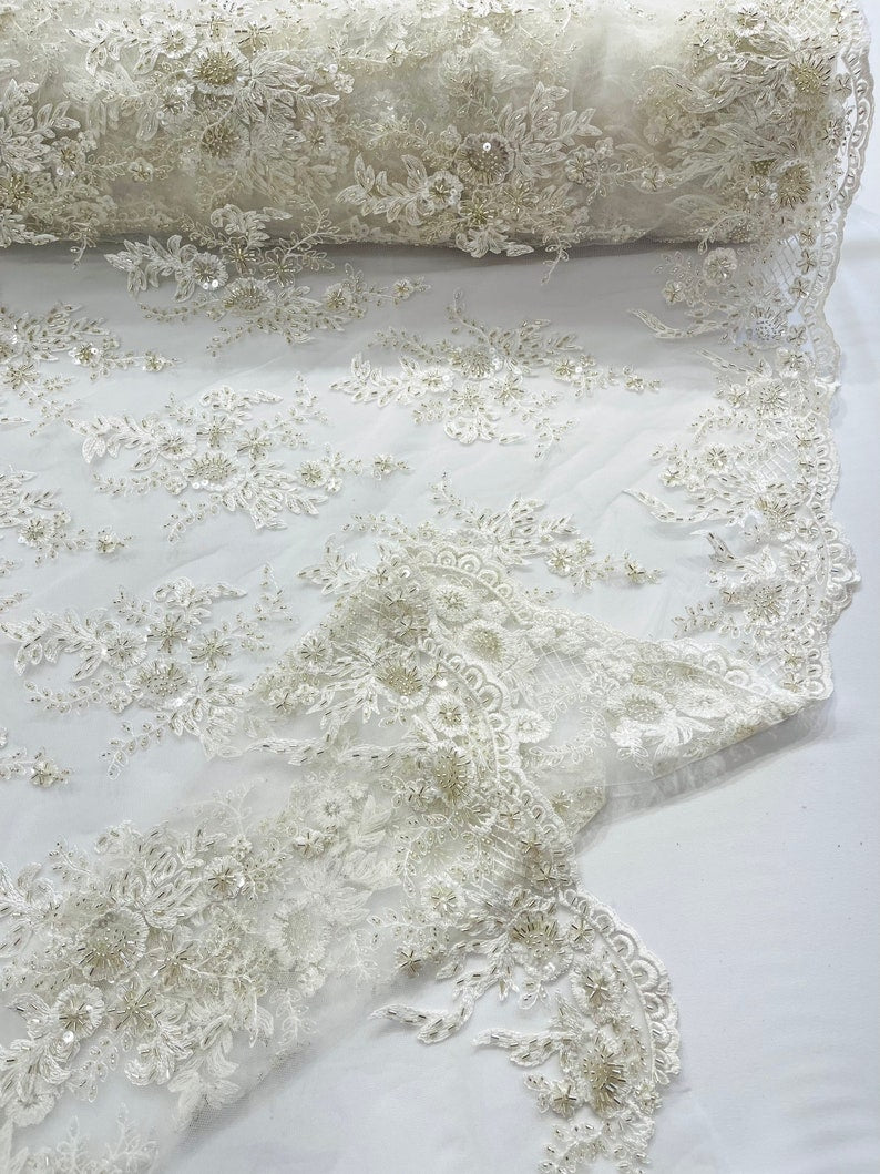 Metallic Ivory Gorgeous French design embroider and beaded on a mesh lace. Wedding/Bridal/Prom/Nightgown fabric
