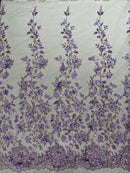 Princess Glitter 3d floral design embroidery with pearls in a mesh lace-sold by the yard.