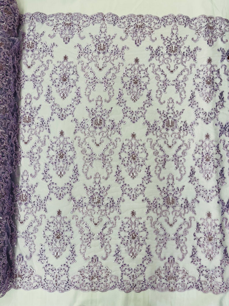 Lilac Damask embroider with sequins and heavy beaded on a mesh lace fabric-sold by the yard