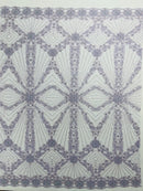 Luxury Bridal Fabric with Geometric Beading on a mesh, by The Yard.