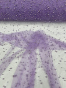 Heavy Scattered Pearls Studded Mesh, 2-Way Stretch, sold by the yard.