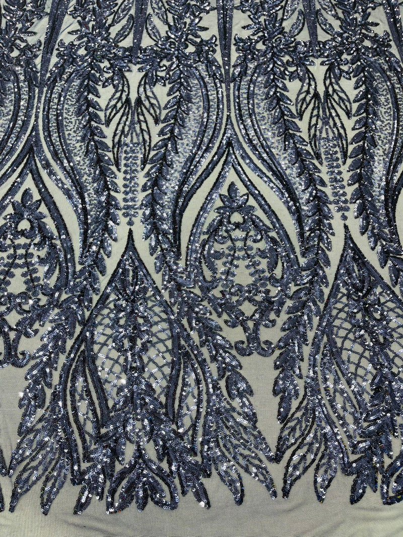 Damask design with sequins embroider on a 4 way stretch mesh fabric.