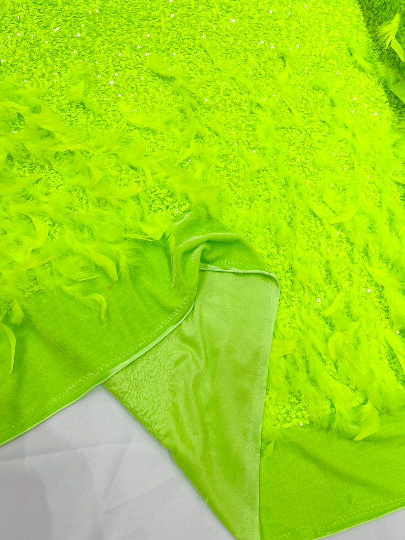 Neon Green 5mm sequins on a stretch velvet with feathers 2-way stretch, sold by the yard