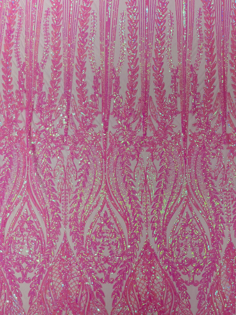 Damask design with sequins embroider on a 4 way stretch mesh fabric.