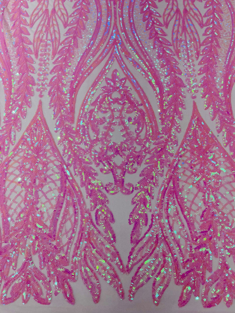 Damask design with sequins embroider on a 4 way stretch mesh fabric.