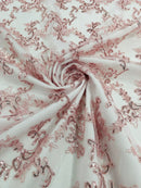 Flower lace corded and embroider with sequins on a mesh-Sold by the yard.