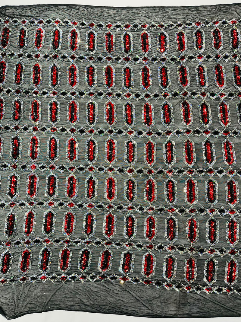 Red/Silver multi color iridescent Jewel sequin design on a black 4 way stretch mesh fabric.