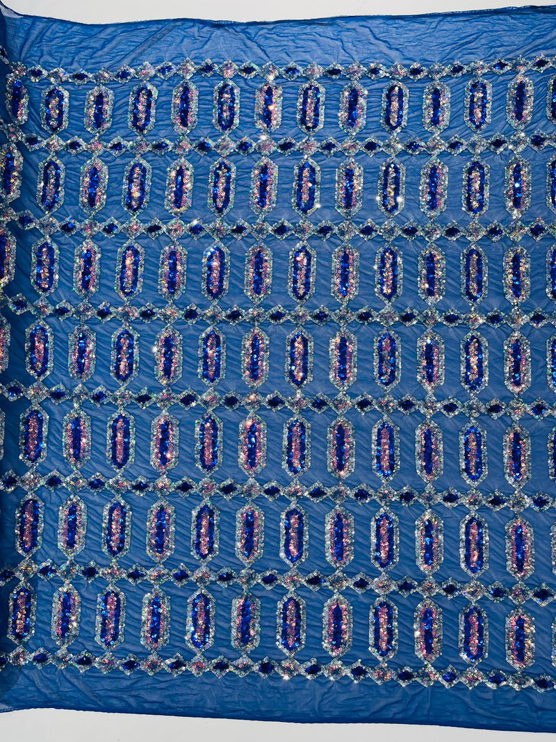 Royal Blue/Silver multi color iridescent Jewel sequin design on a Royal Blue 4 way stretch mesh fabric.