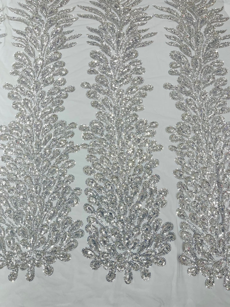 Silver Vegas heavy beaded and sequins feather design embroidery on a mesh fabric-Sold by the 1 Feather Panel W-12Inc x L-48Inc.