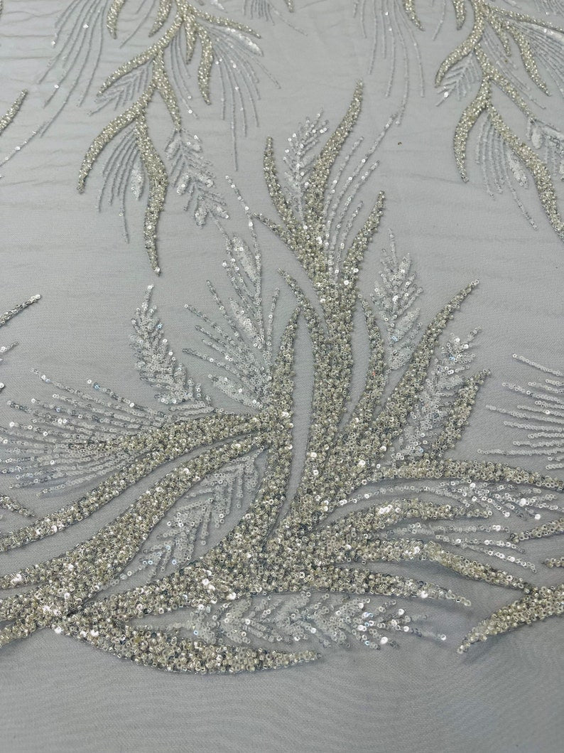 Metallic Silver Gorgeous French design embroider and beaded on a mesh lace. Wedding/Bridal/Prom/Nightgown fabric