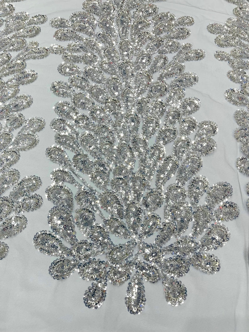 Silver Vegas heavy beaded and sequins feather design embroidery on a mesh fabric-Sold by the 1 Feather Panel W-12Inc x L-48Inc.