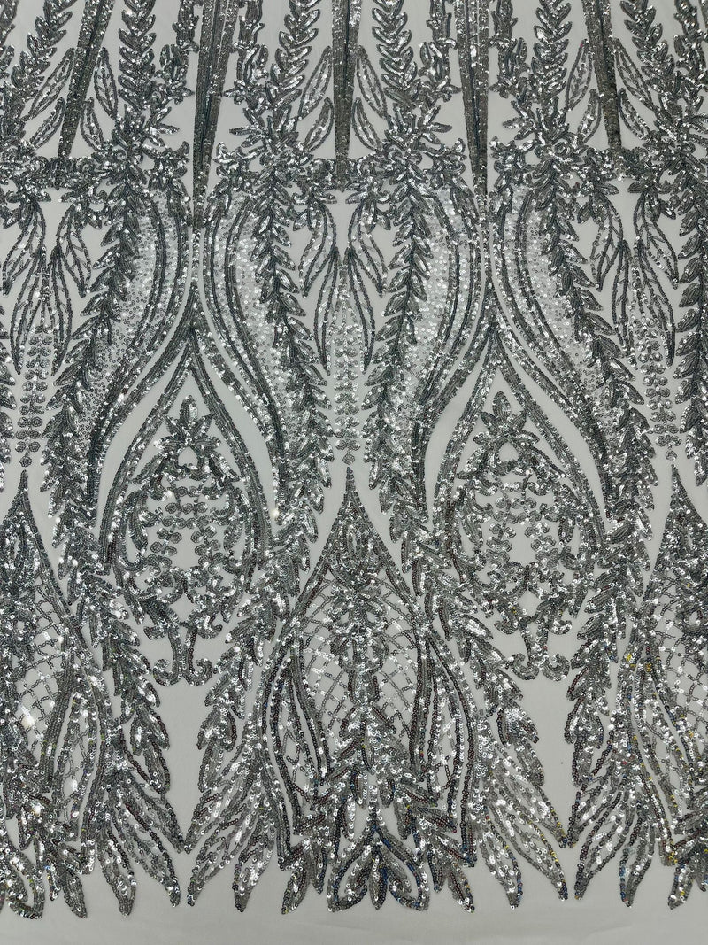 Damask design with sequins embroider on a 4 way stretch mesh fabric.