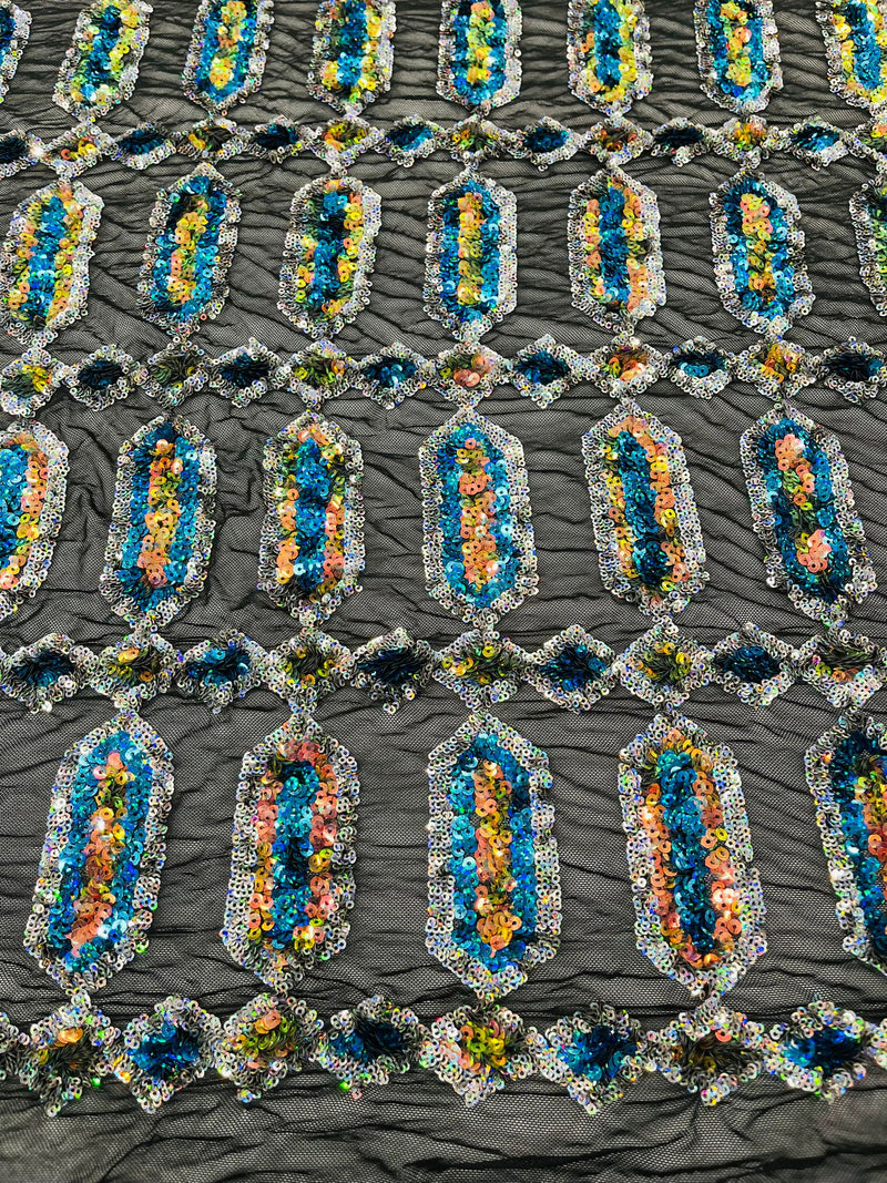 Turquoise/Silver multi color iridescent Jewel sequin design on a Black 4 way stretch mesh fabric.