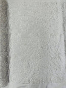 Damask embroider with sequins and heavy beaded on a mesh lace fabric-sold by the yard