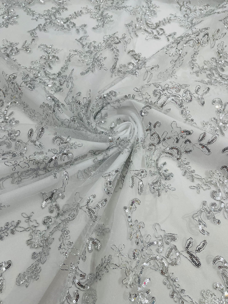 White/Silver Flower lace corded and embroider with sequins on a mesh-Sold by the yard.