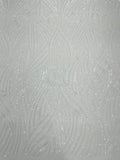 Geometric Feather wing shiny sequin design on a 4 way stretch mesh Fabric-old by the yard.