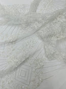 Luxury Bridal Fabric with Geometric Beading on a mesh, by The Yard.