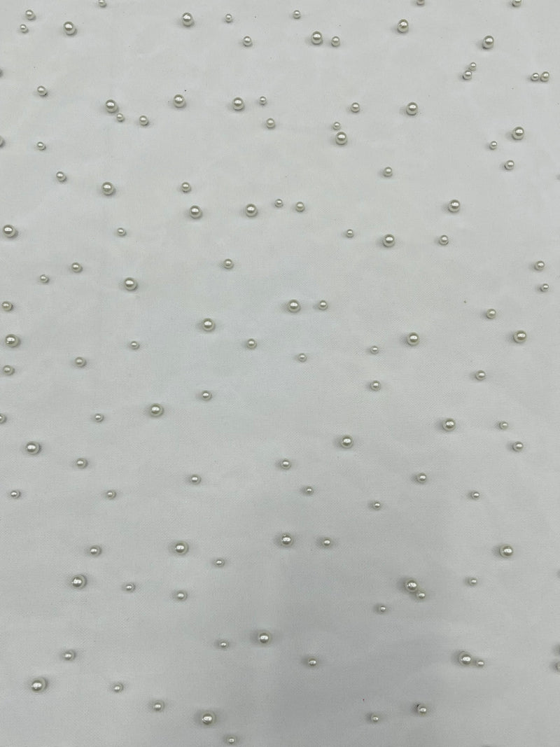 Heavy Scattered Pearls Studded Mesh, 2-Way Stretch, sold by the yard.