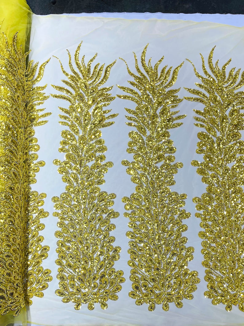Yellow Vegas heavy beaded and sequins feather design embroidery on a mesh fabric-Sold by the 1 Feather Panel W-12Inc x L-48Inc.