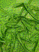 Leopard oil spill metallic print on a stretch nylon spandex| New Creations Fabric & Foam Inc. - New Creations Fabric & Foam Inc